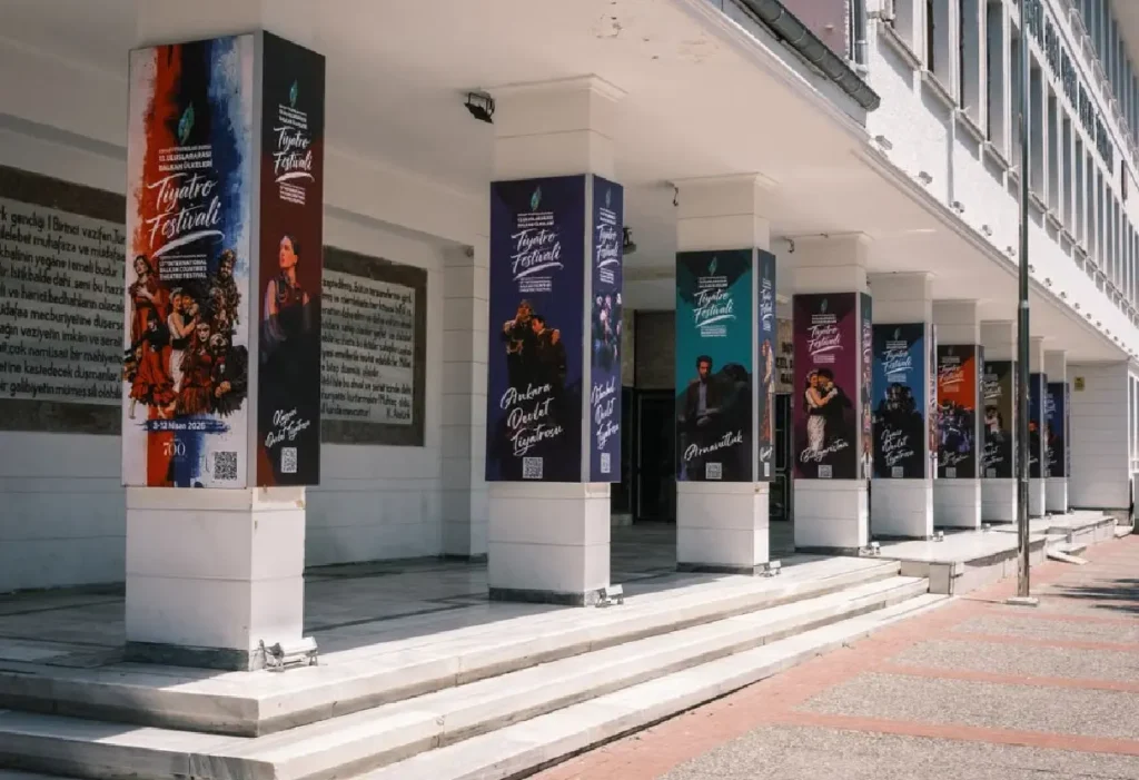 Branded promotional banners displayed on building columns