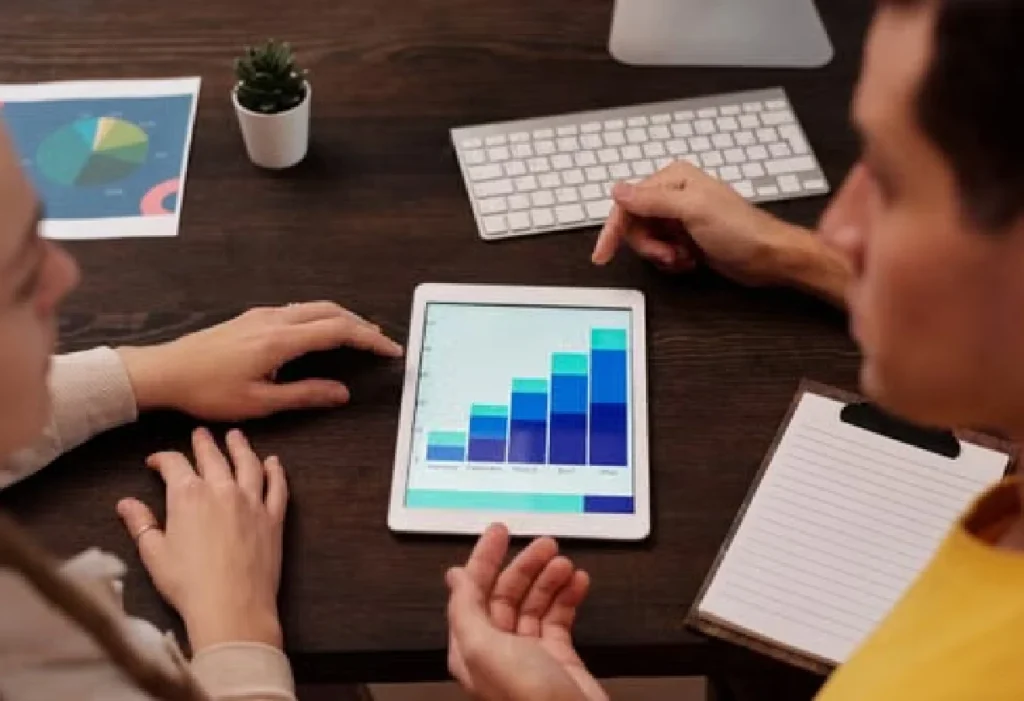 Professionals reviewing business analytics