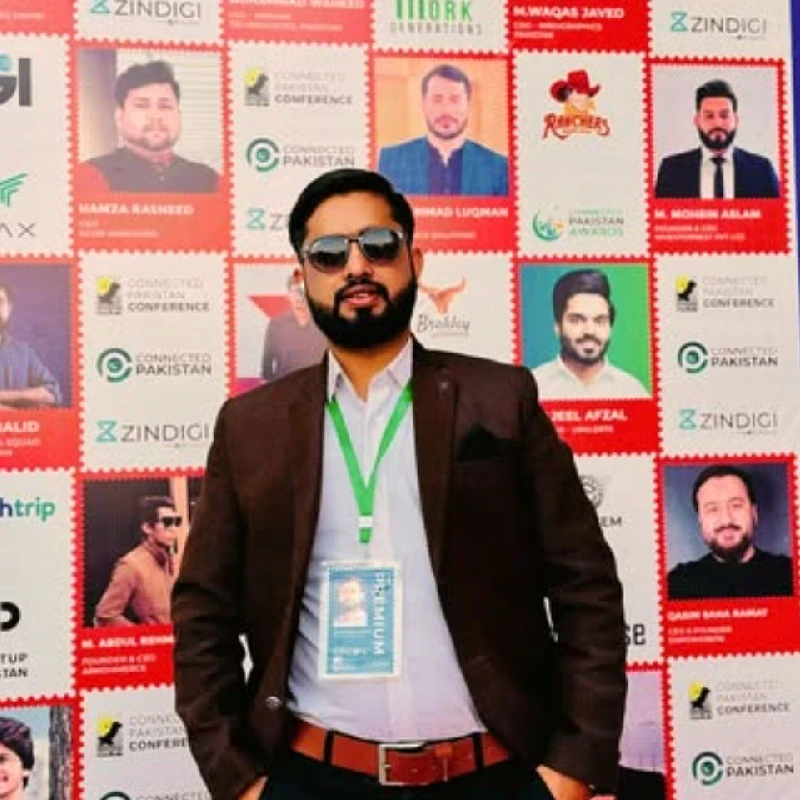 Home 64 Professional attendee posing at a business networking and industry event.